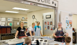 Food service employees working in the lunchroom
